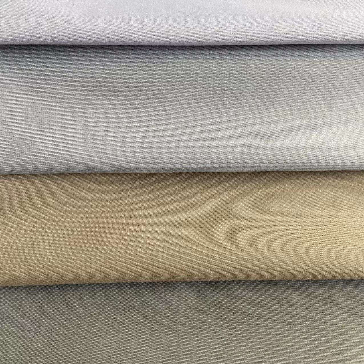 Fire Retardant Curtain Fabrics 100% Polyester Double Sides Textured Blackout  Window Drapes Darkening Fabric supplier