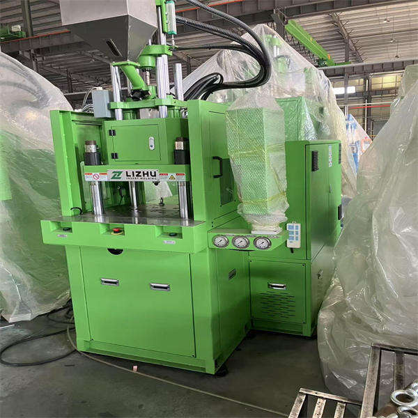 Machine de moulage par injection verticale à haute vitesse