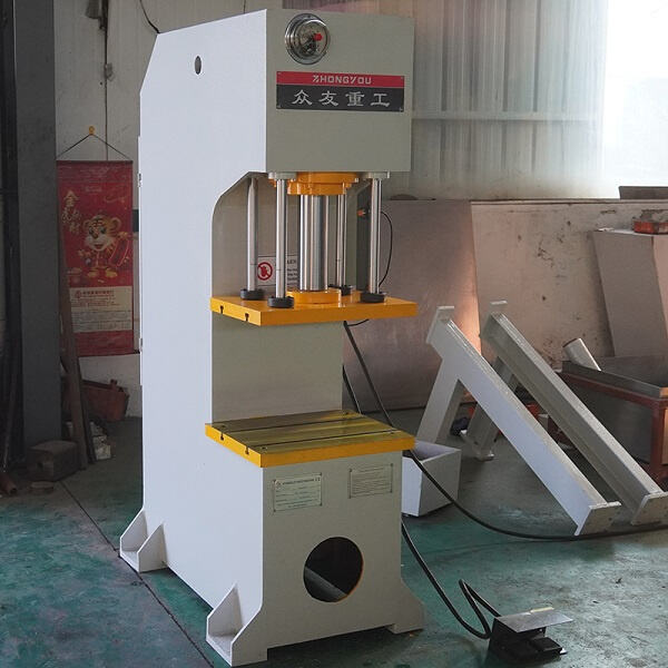 Achieve with a single arm hydraulic press.