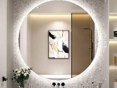 The backlit circle mirror: a must-have item for every stylish home.