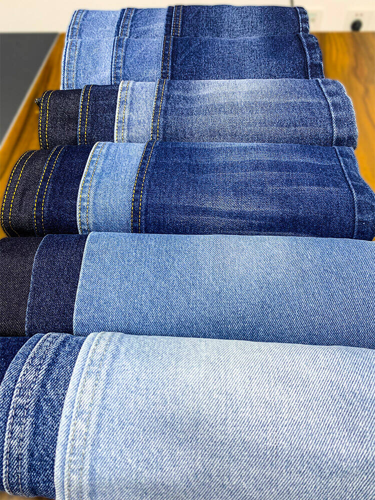 Custom wholesale factory direct sales women's new retro casual fashion single letter print hole washed slim jeans supplier