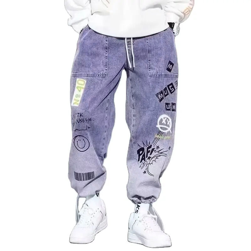 New Autumn 2024 Men's Trendy Brand Buckle Jeans Denim Loose Casual Graffiti Men Drawstring Elastic Waist Harem Pants supplier