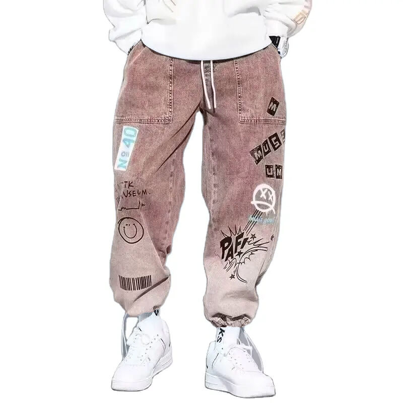 New Autumn 2024 Men's Trendy Brand Buckle Jeans Denim Loose Casual Graffiti Men Drawstring Elastic Waist Harem Pants supplier