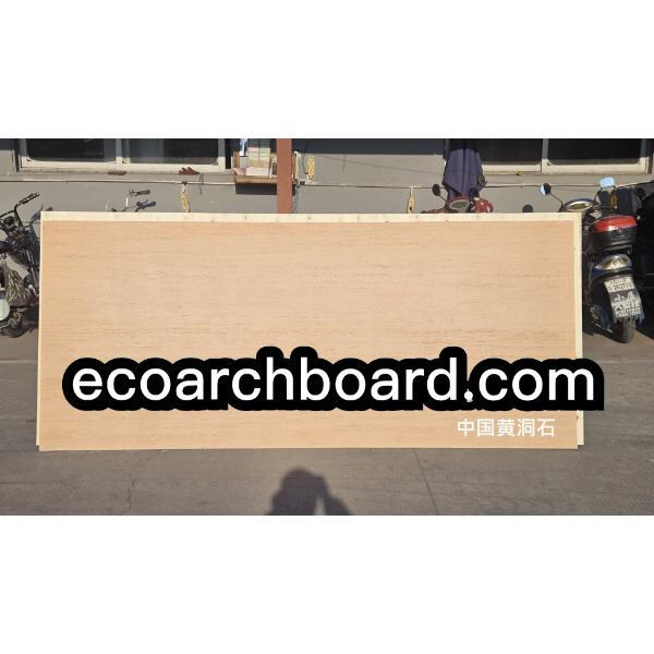 Classic charm meets modern sophistication with travertine walls."