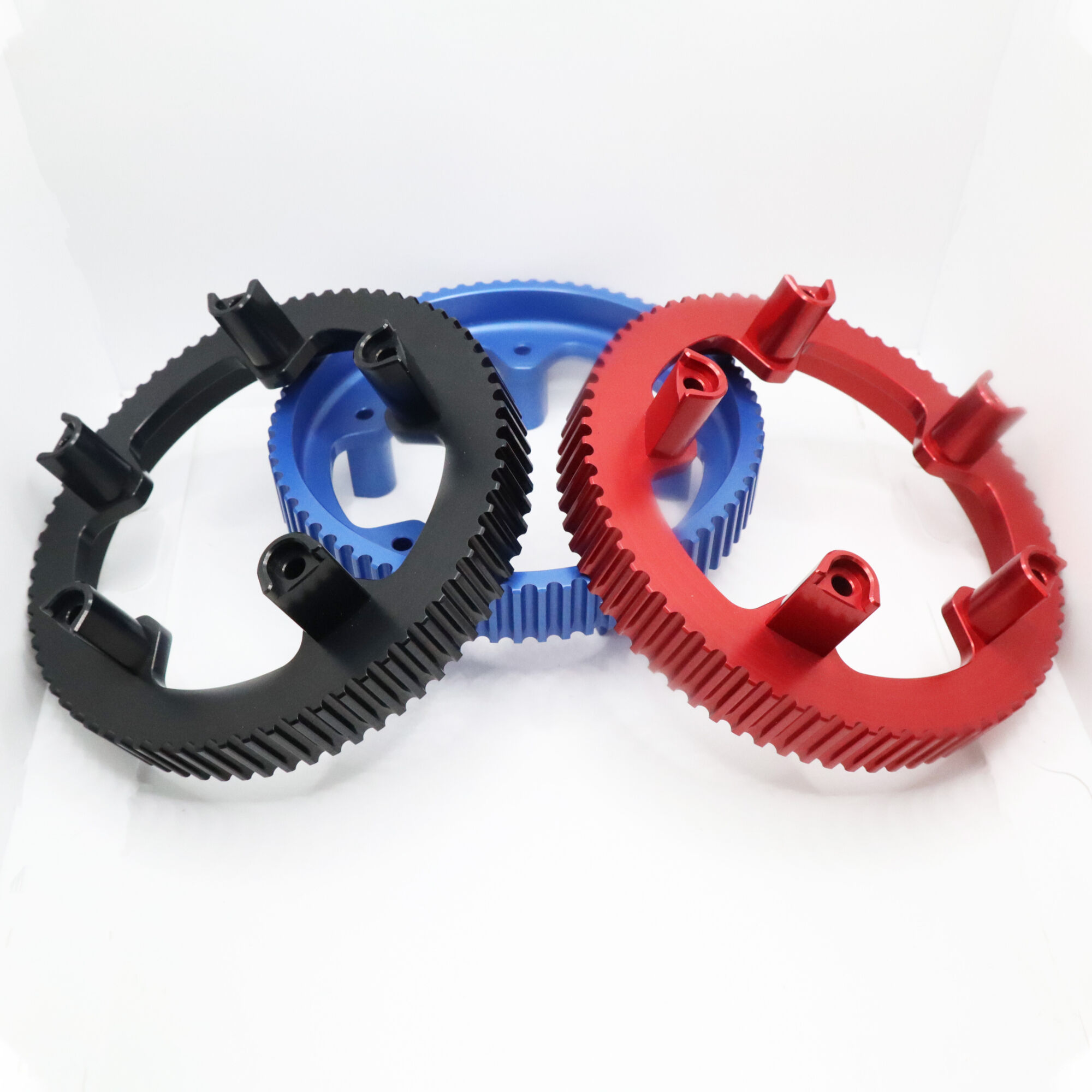 Elite Red, Blue, and Black Gear Wheel - High-Performance Multi-Colored Transmission Component for Precise Industrial Applications