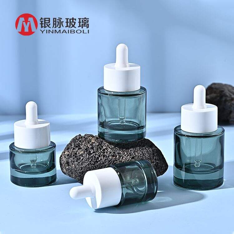 Yinmai Glass Luxury Custom Logo Flat Shoulder Thick Bottom 15ml 20ml 30 ml 40ml 50ml Cosmetics Glass Serum Bottle