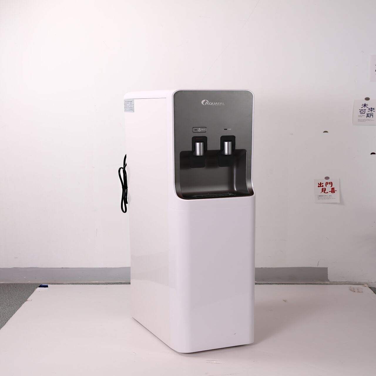 Hot and cold water dispenser for home use.