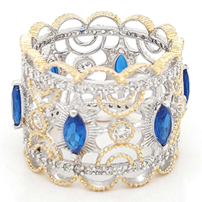 Royal crown type ring with blue gemstone