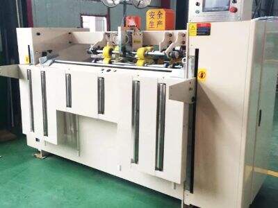 현대식 자동 박스 스티칭 기계를 정의하는 자동화 기능은 무엇인가요?