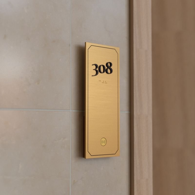 Brass Braille hotel sign