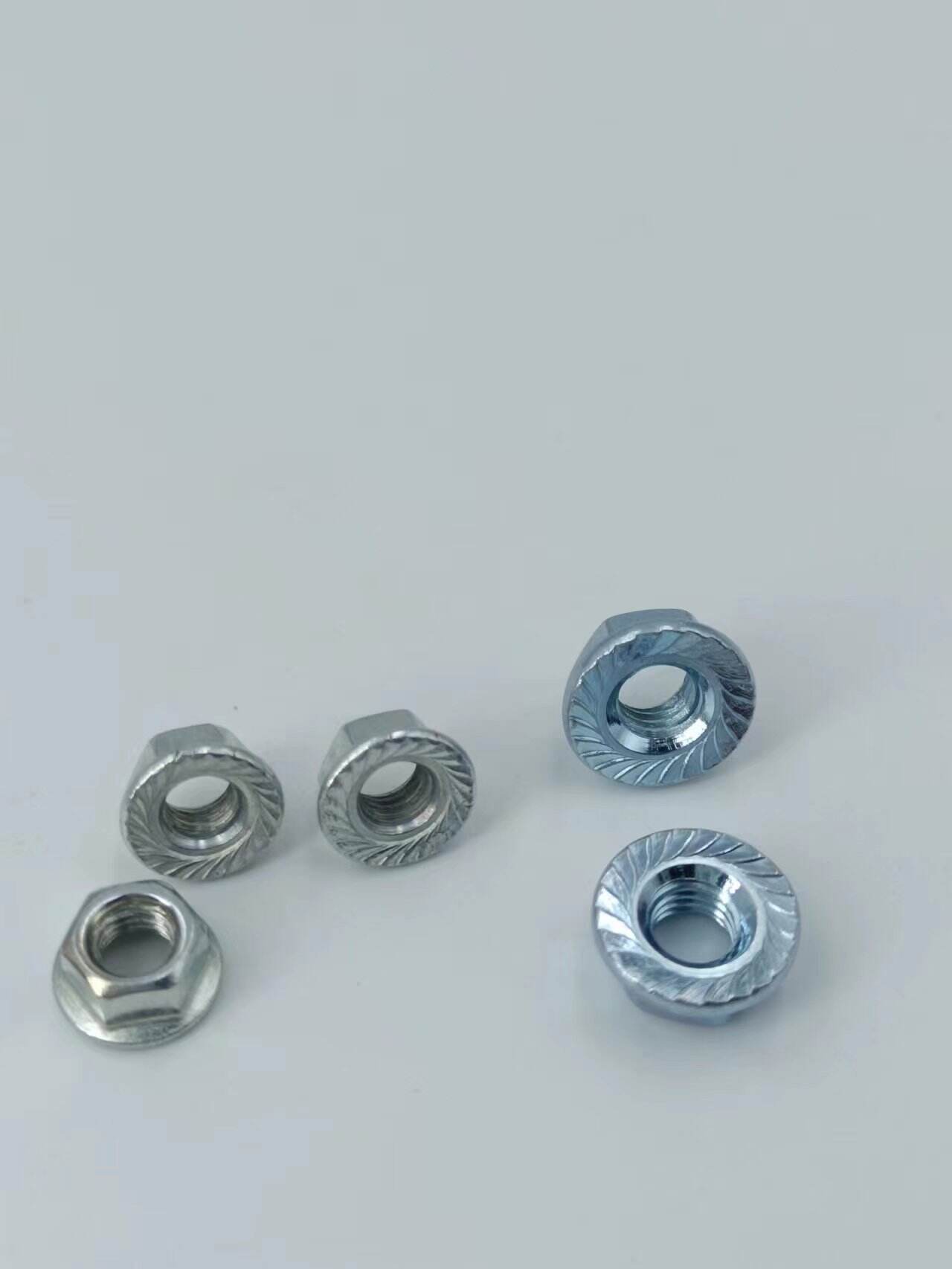 304 Stainless Steel Flange Nut 201Tooth locking 316 non-slip hexagonal flange nuts supplier