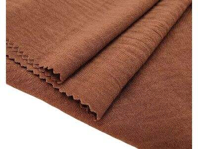 Scuba Crepe Duplicis Texturae ad Vestimenta Muliebria Confecta