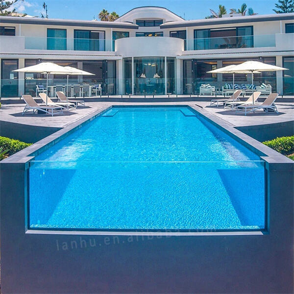 Bakit Pinipili ng mga Diseñador ng Custom Swimming Pool ang Acrylic para sa Mga Mahahangin na Pool