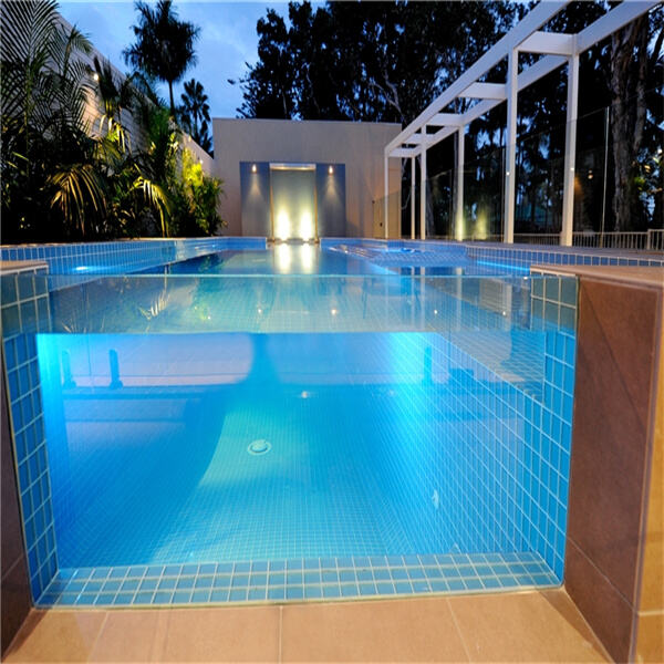 The cost-effectiveness of an acrylic pool wall compared to traditional materials.