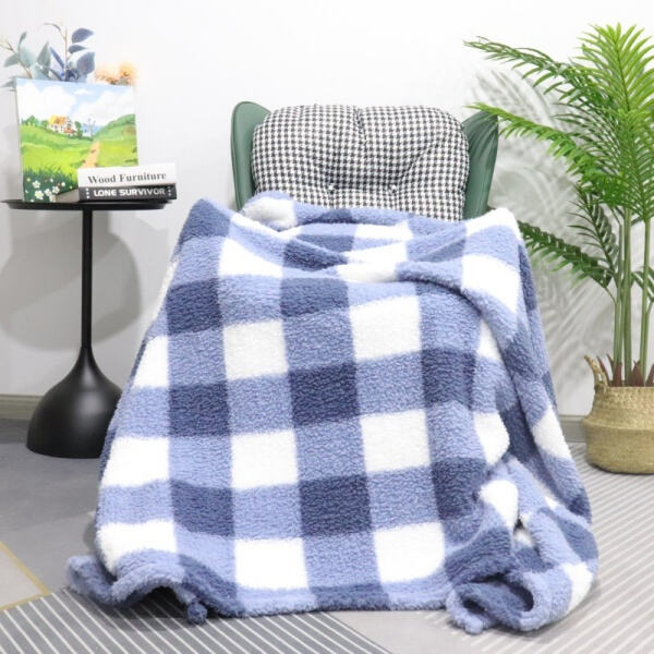 Snuggle up in style with our fashionable sherpa blanke