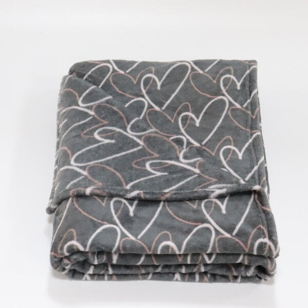 Transform your sofa into a cozy haven with these soft throws.
