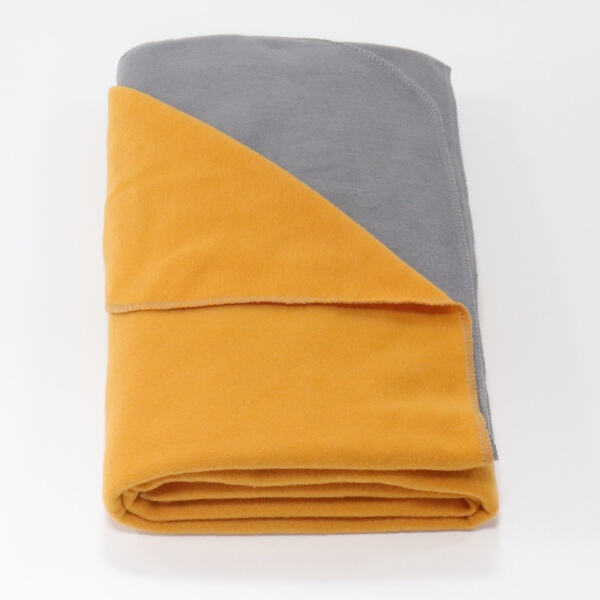 Transform Your Space with a Bold Orange Throw Blanke