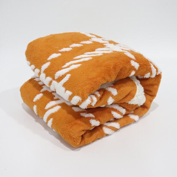 Snuggle up with a Sherpa plush throw, perfect for any occasion.