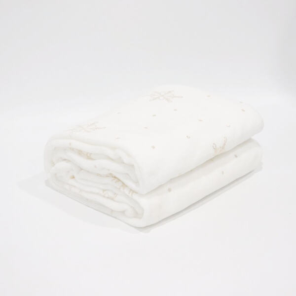 Embrace the feeling of relaxation with a fluffy throw blanket by your side