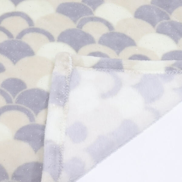 Embrace the warmth of a plush fuzzy blanket