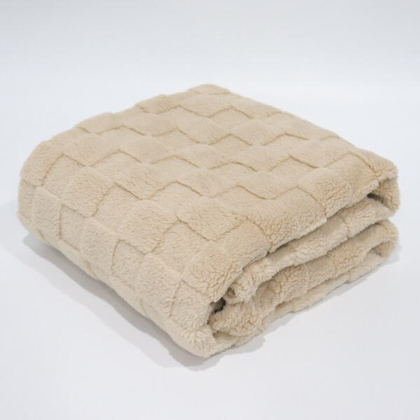 Stay warm this season with a fleece and sherpa throw