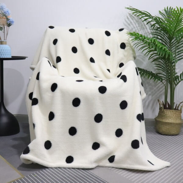 Elevate your snuggle game with a luxurious fleece sherpa blanke
