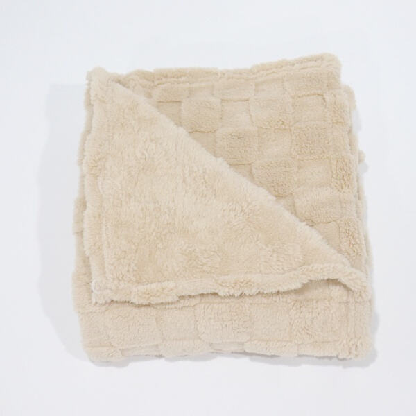 Upgrade your comfort with a fleece and sherpa throw
