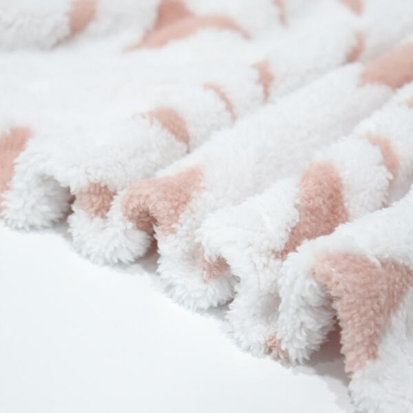 Make holiday memories snuggled up in a sherpa Christmas throw