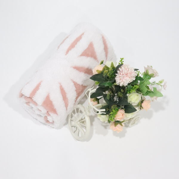 Relax in luxury with a soft fleece and sherpa blanket.