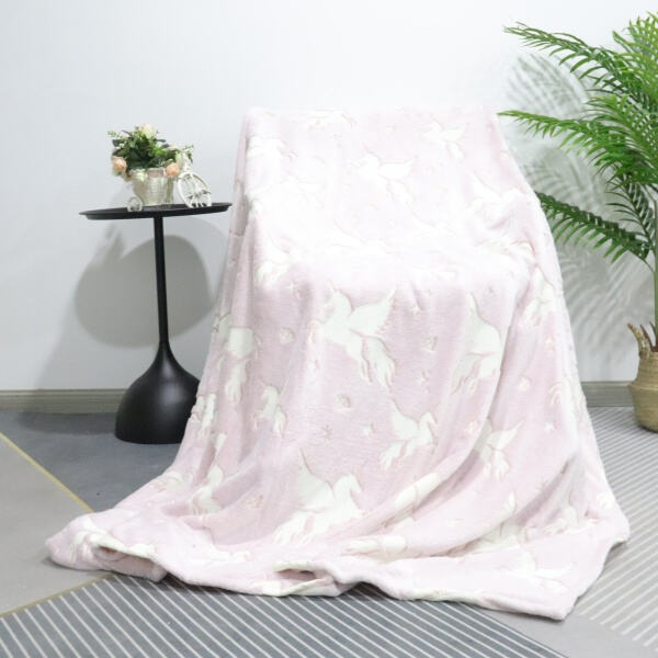 Bring beach vibes indoors with a coral-inspired throw blanke