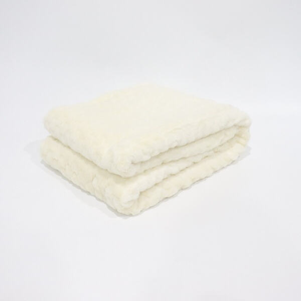 Soothe your senses with our luxurious white fleece blanke