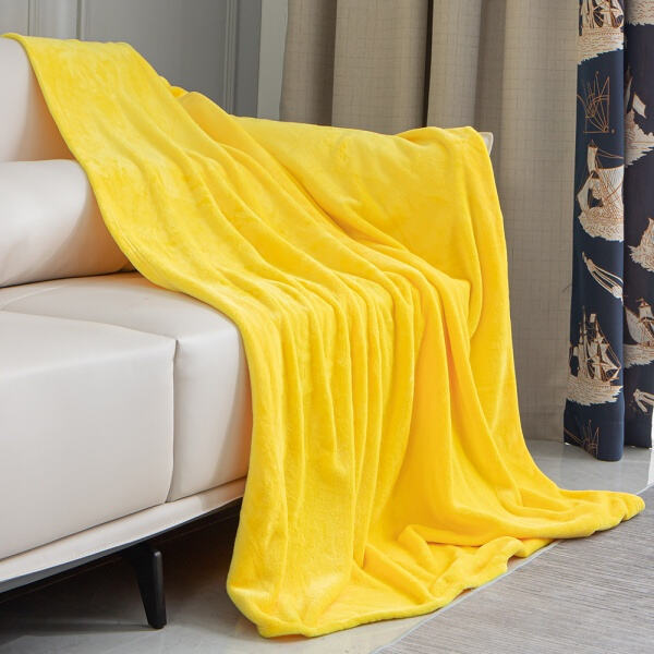Upgrade your Netflix game with our yellow fleece throw