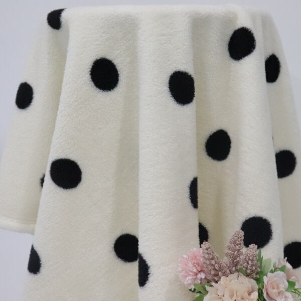Experience ultimate relaxation with our fluffy white Sherpa blanke