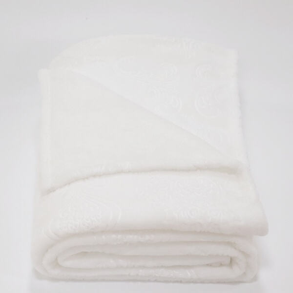 Add a touch of sophistication to your du00e9cor with our white fleece blanke