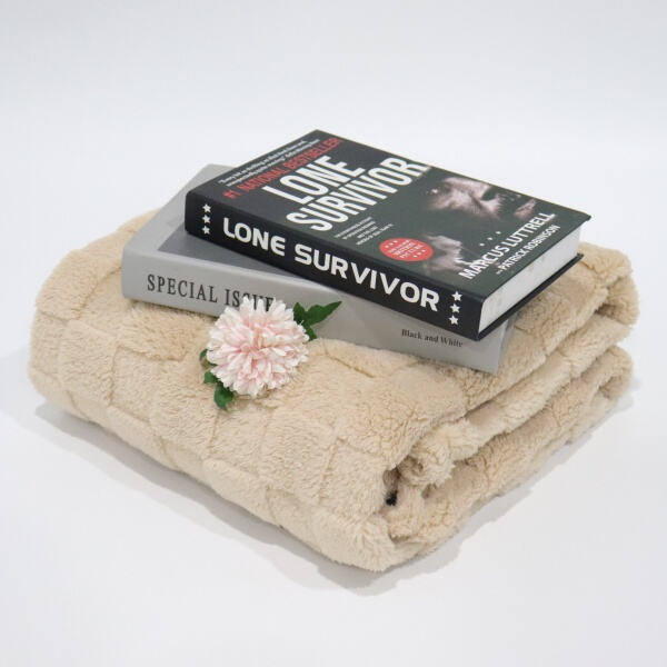 The perfect gift for anyone seeking ultimate comfort - a fleece and sherpa blanket.