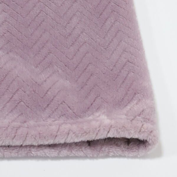 From Practical Blankets to High Fashion