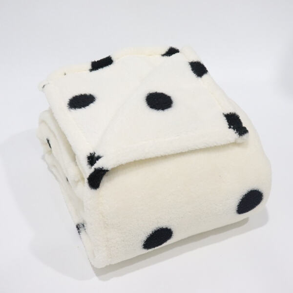 Add style and warmth to your living space with our white Sherpa blanke