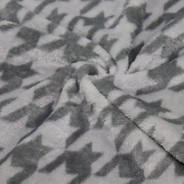 The Practical Benefits of Black and White Fleece Fabric