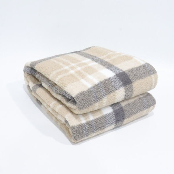 Wrap yourself in comfort with a brown fleece blanke