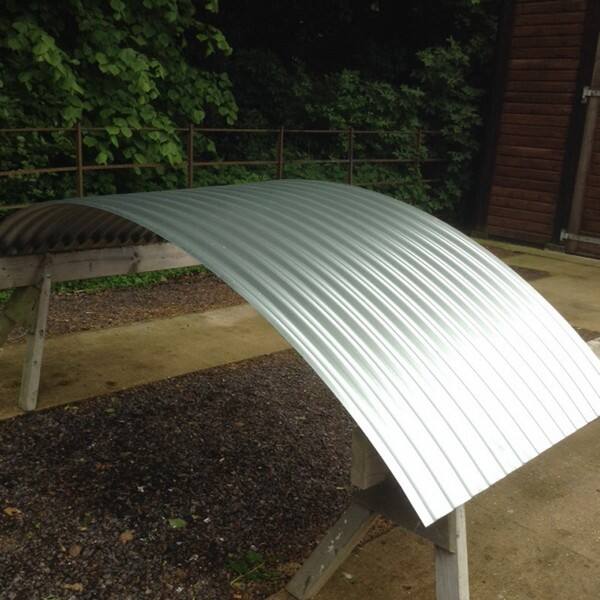 Energy-efficient galvanized metal roof panels for cost savings