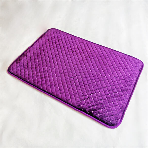 Step onto luxury with a soft pink bath ma