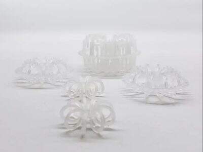 Random packings minimize pressure drop in demanding vacuum distillation service