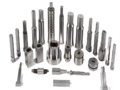 What are the components of a stamping tool?