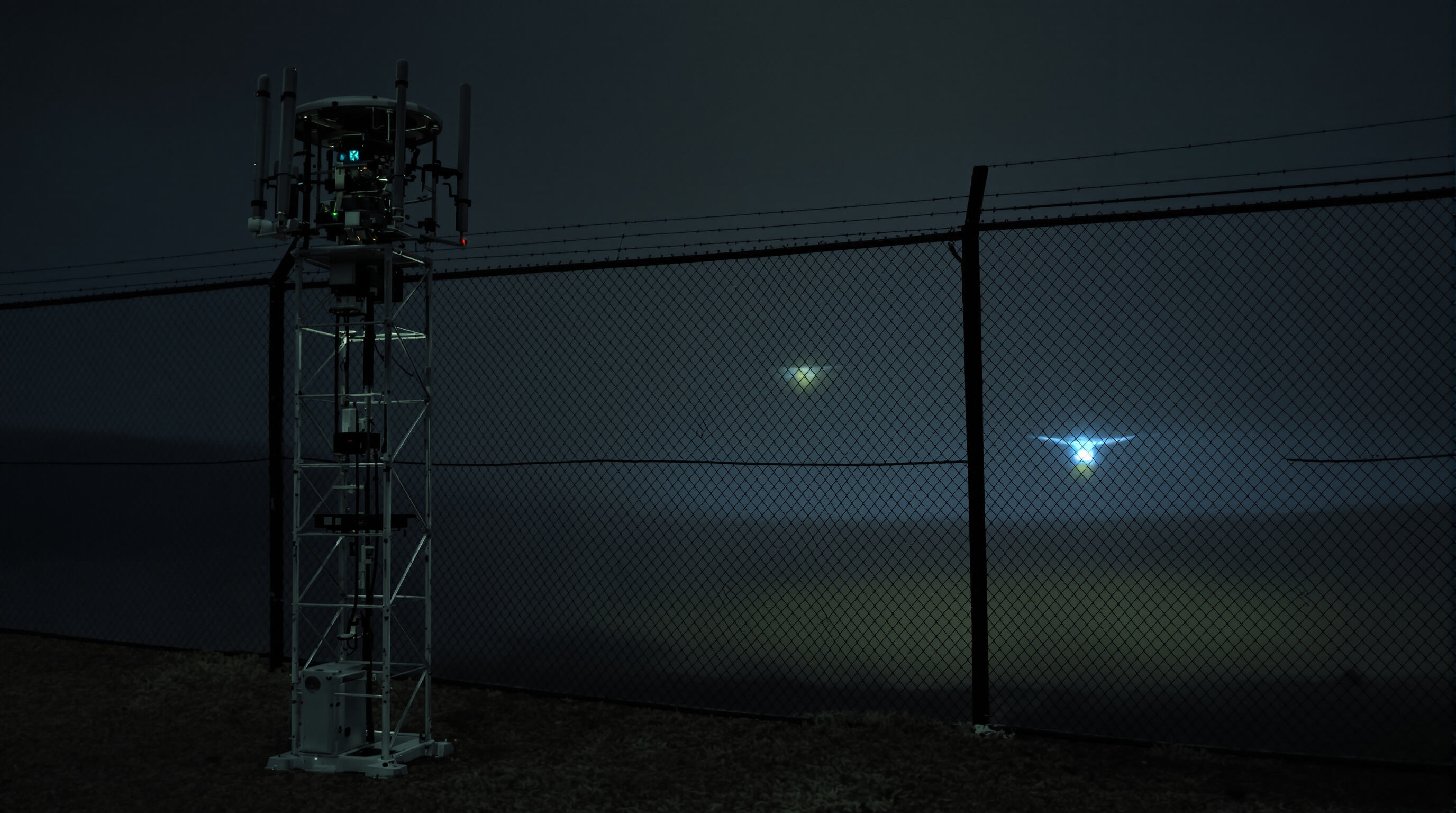 Anti-drone sensors including radar, RF antennas, and thermal camera fused together catching a drone in low visibility conditions