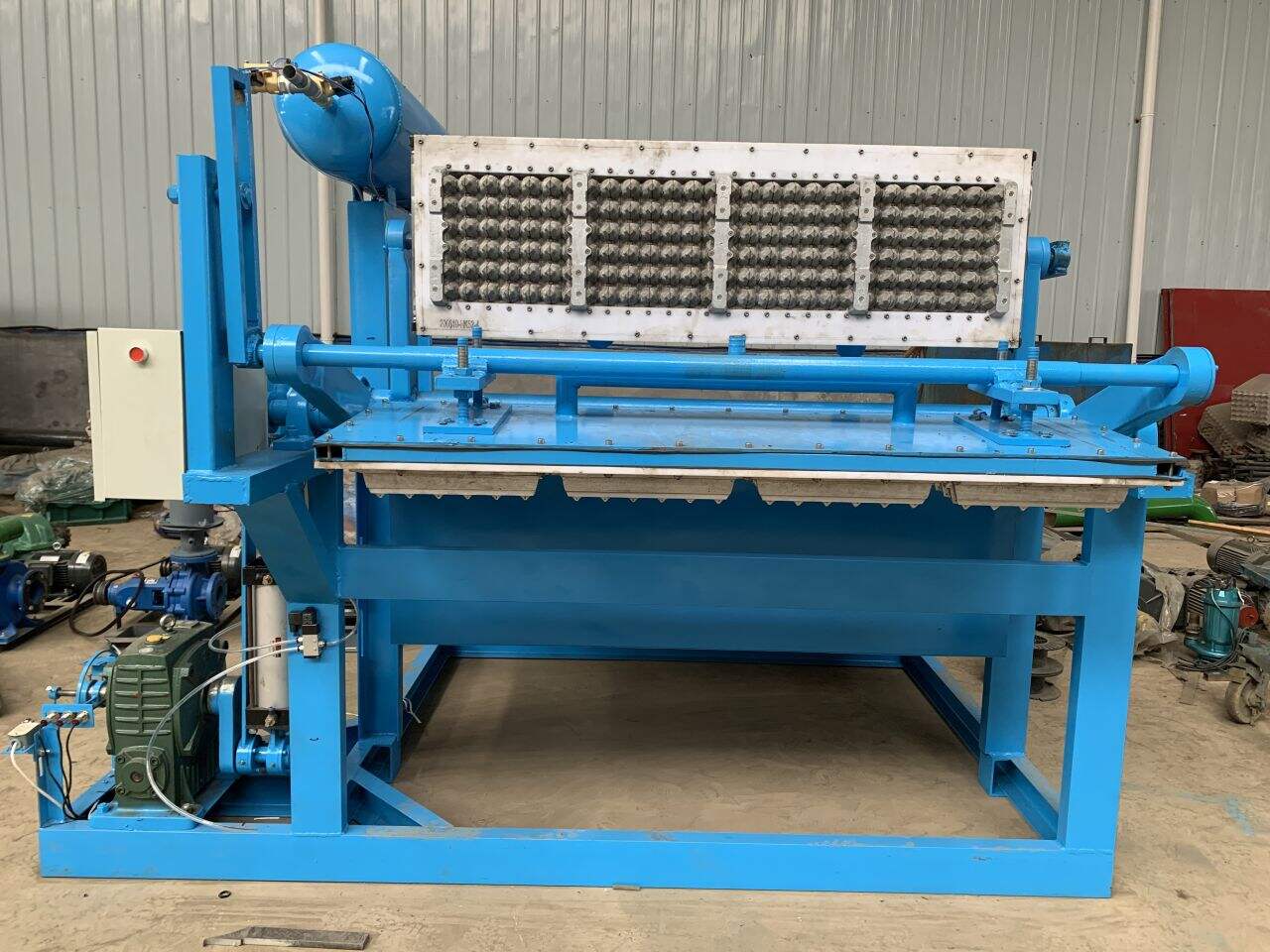 Achieve Efficiency and Consistency in Your Egg Tray Packaging with an Automated Stacker and Strapper.