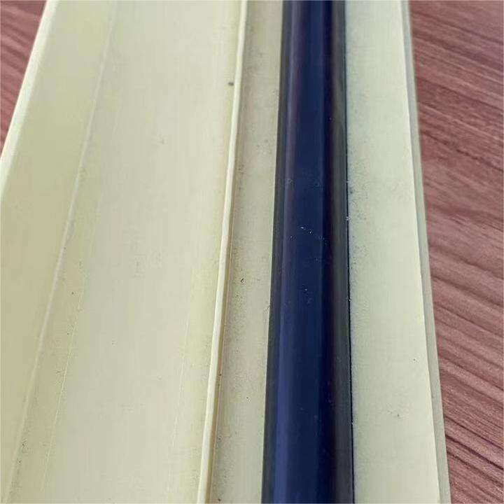 PVC profiles co-extruded with rubber