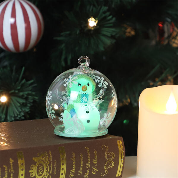 Experience the magic of snowfall all season long with your snowman snow globe