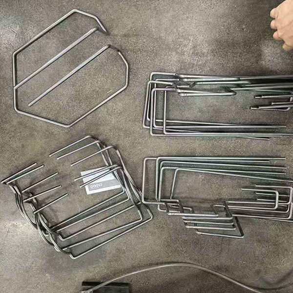 Automated wire forming with a 2D CNC bender