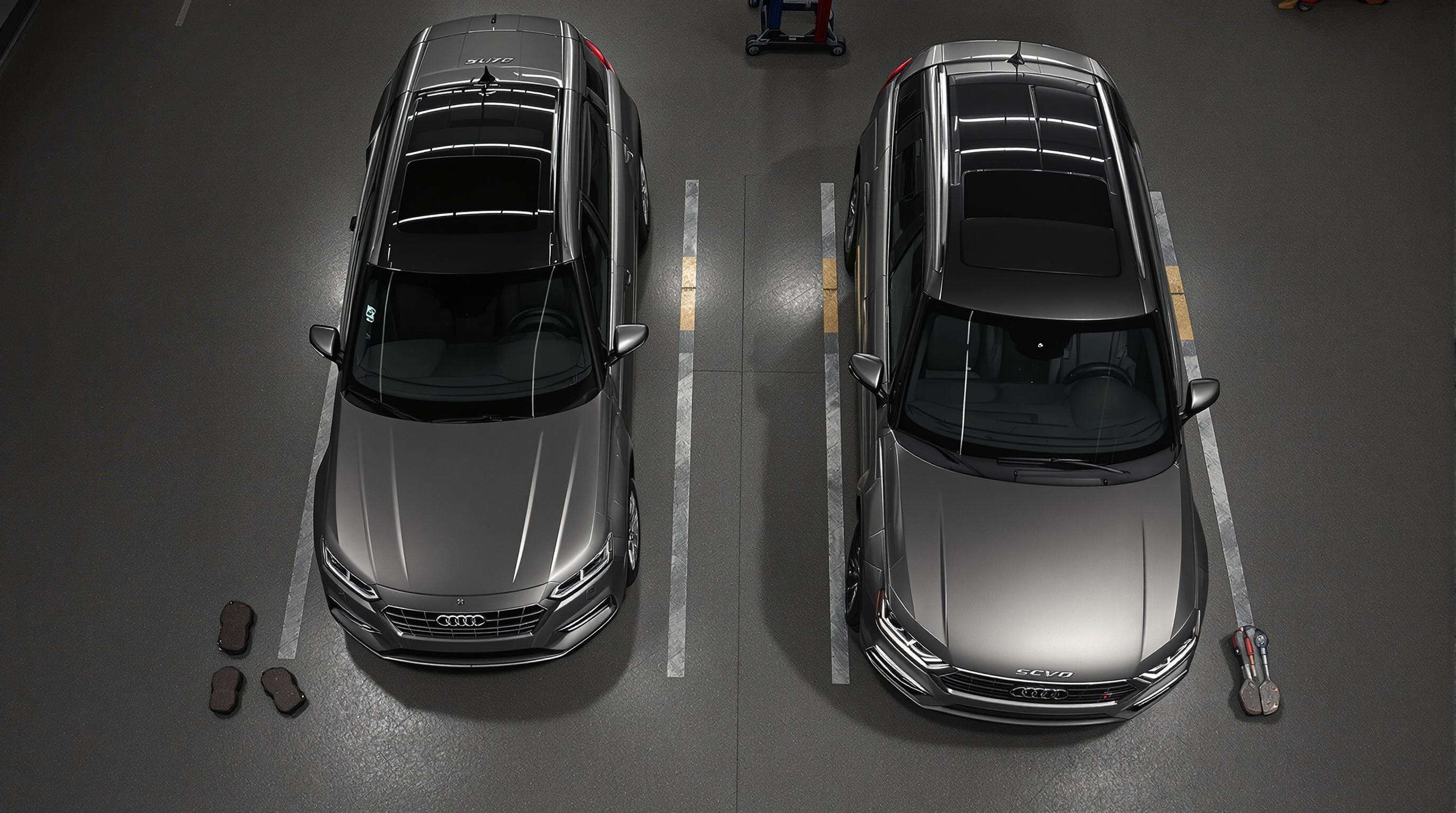 Photorealistic scene of sedan and SUV in a workshop illustrating maintenance cost differences