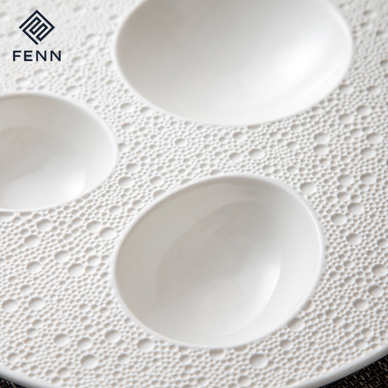 Unique Shape Nordic White Porcelain Egg Shape Lunar Surface Soup Platter Hotel Restaurant Used Wholesa Ceramic Appetizer plate factory